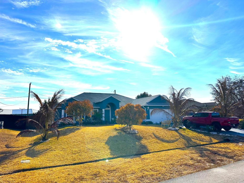 Photo of 4239 SW Callicoe Street, Port Saint Lucie, FL 34983 (MLS # R11163063)