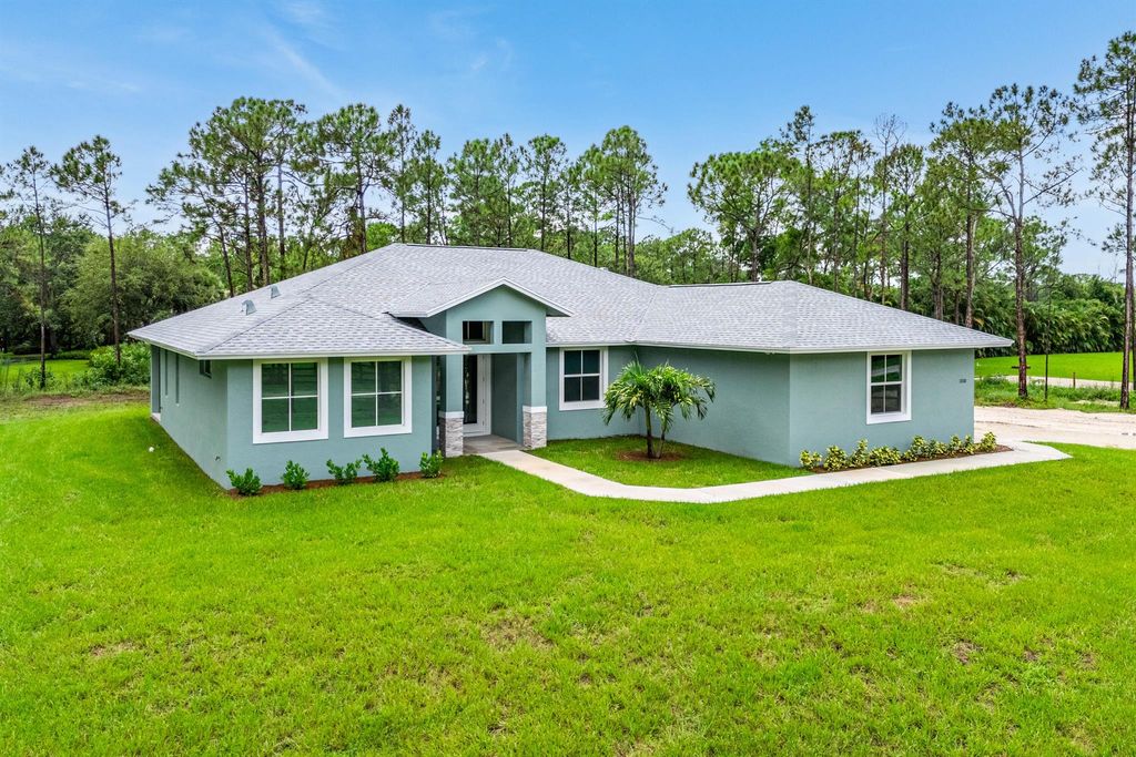 Photo of 13110 152nd Road N, Jupiter, FL 33478 (MLS # R10981750)