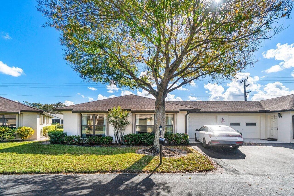Photo of 4862 Equestrian Road, Boynton Beach, FL 33436 (MLS # B26087484)