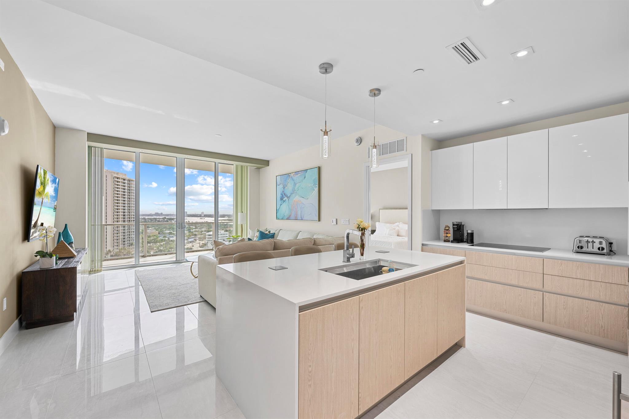 Awaken to breathtaking sunrises each morning from this stunning brand new residence at the Amrit resort located on Singer Island's happiness tower, where casual elegance meets unparalleled luxury living!This newly furnished two bedroom two bathroom residence features a private balcony with sensational ocean views.Each bedroom has balcony access with plenty of natural light on all rooms.The master suite features a walk-in closet, with a modern spa like bathroom, walking in shower and soaking tub. Including a king size Restoration Hardware bed in the master suite, a Queen size Restoration Hardware bed in the junior suite and a Queen size sofa bed in the living room accommodating 6 guests. Each bedroom features a smart flatscreen TV.