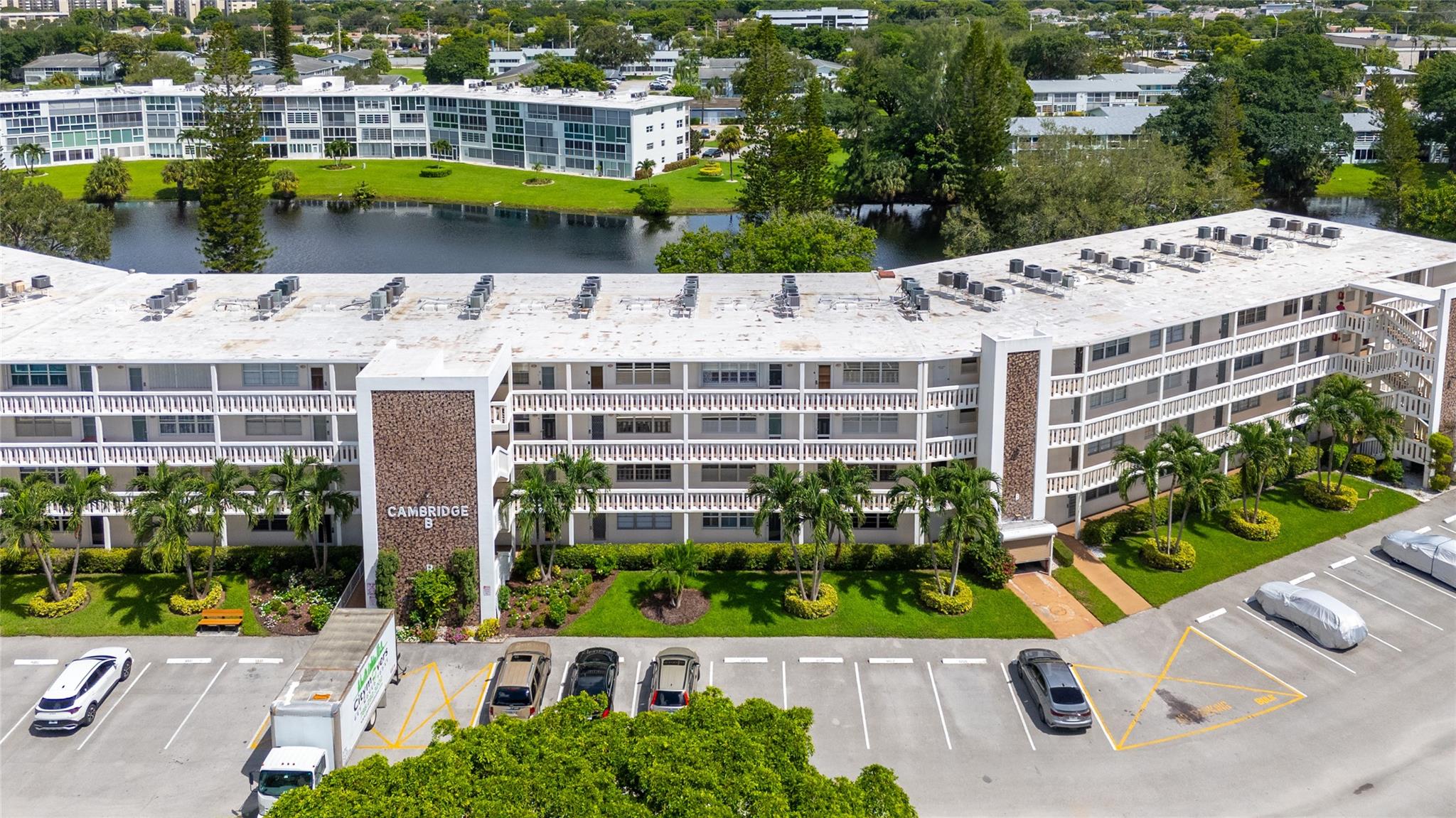 Water view condo - Century Village East. 1 bedroom and 1.5 bathroom on the 3rd floor of a desirable High-rise building. Patio/ Florida room and front door has impact windows installed in 2023. Patio is overlooking on the spectacular water view with nice and relaxing shade in the afternoon. Inside you will find bathroom with jetted tub. A/C is 4 years old. New elevator replaced in 2023. New roof replaced in 2025. Barbecue area. Condo is sold furnished. Painting in the living room and decorative items do not convey. Unit is very clean and ready to move in. 4 miles to the beach! Century Village has so much to offer. Free transportation to the shopping plazas, tennis courts, pickleball and Fitness Club with sauna, outdoor and indoor swimming pools This beautiful, safe home is waiting for you!