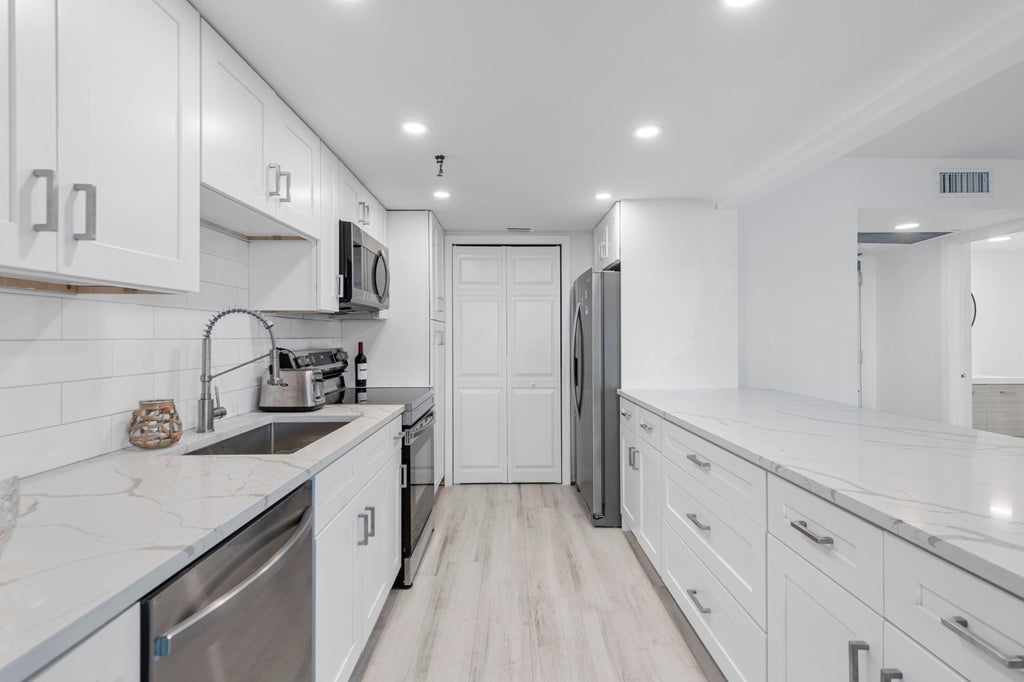 Photo of 859 Jeffery Street #212, Boca Raton, FL 33487 (MLS # B26080089)