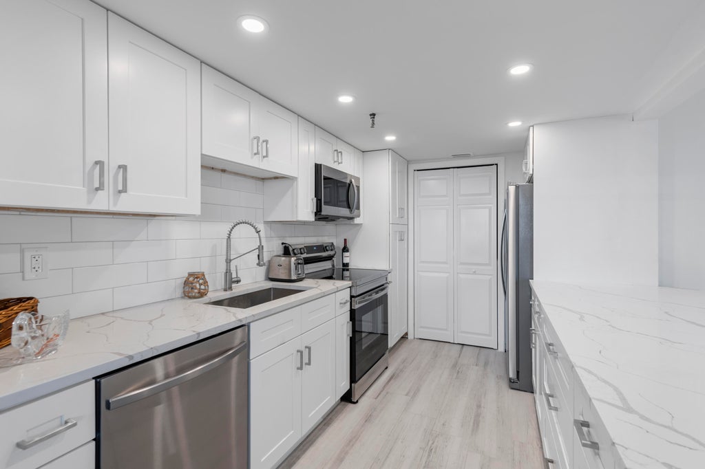 Photo of 859 Jeffery Street #212, Boca Raton, FL 33487 (MLS # B26080089)