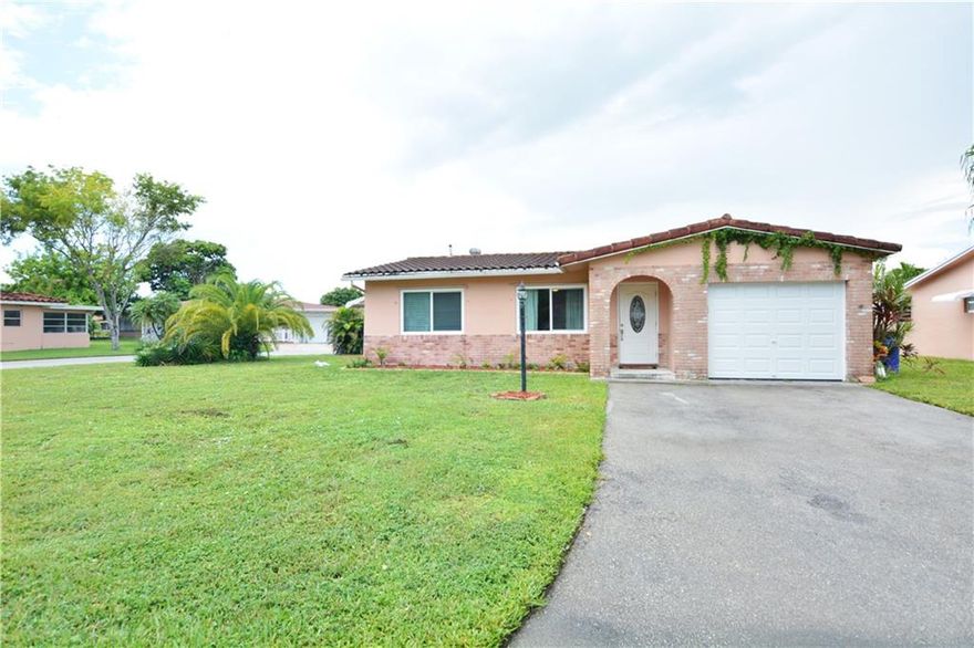 Updated and move in ready two bedroom, two bathroom home with newer open plan kitchen featuring granite counter tops and a large pantry.  AC replaced in 2015.  Impact front door, garage door and most windows.  Large driveway and one car garage on a big corner lot. Spacious Florida room (26-1/2 x 9) provides extra living space. Low cost Homeowners Association includes lawn maintenance, exterior house paint and a Clubhouse with Heated Pool, Spa, Sauna and Exercise Room.