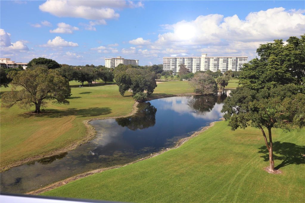 Photo of 565 Oaks Lane #406, Pompano Beach, FL 33069 (MLS # F10428833)