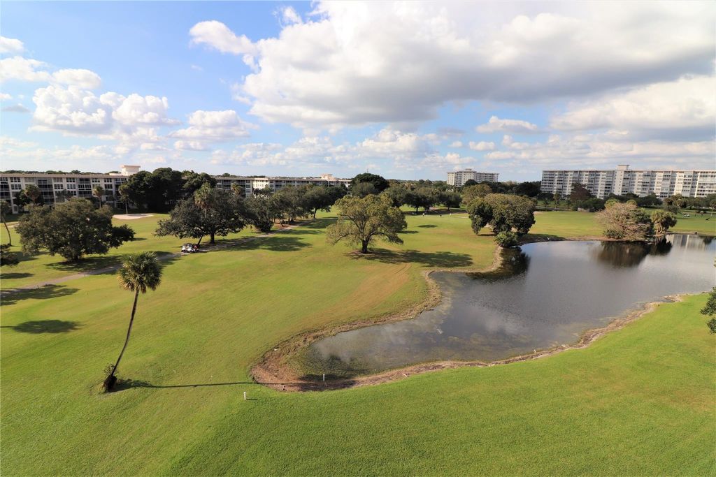 Photo of 565 Oaks Lane #406, Pompano Beach, FL 33069 (MLS # F10428833)