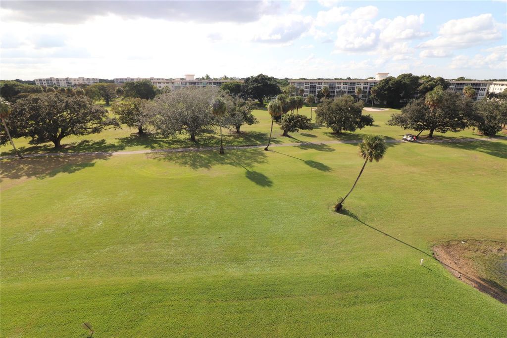 Photo of 565 Oaks Lane #406, Pompano Beach, FL 33069 (MLS # F10428833)