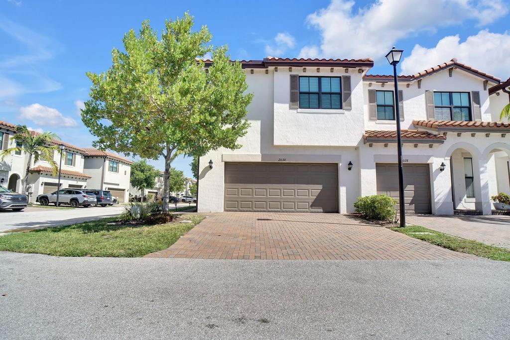 MUST SEE! METICULOUSLY UPDATED 2 LEVEL END UNIT TOWNHOME IN SOUGHT AFTER WOODS EDGE GATED COMMUNITY TOTALING 1,714 SQ FT. MAIN LEVEL OFFERS UPDATED KITCHEN WITH HUGE ISLAND, GRANITE COUNTER TOPS, SS APPLIANCES, BUILT-IN PANTRY WITH PULL OUT DRAWERS & LIGHT CHANGING COLORS. DINING AND LIVING ROOM W/ RECESSED LIGHTING, SLIDER DOOR W/ ACCESS TO FENCED IN REAR PATIO, POWDER ROOM AND DOOR ACCESS TO LARGE 2 CAR GARAGE. UPPER LEVEL PRIMARY EN-SUITE HAS LARGE WALK-IN CLOSET, AND ADDITIONAL CLOSET W/ BUILT-IN CABINET AND ATTIC ACCESS. ATTACHED PRIMARY BATHROOM HAS DUAL VANITY, GRANITE COUNTERS, WALK-IN SHOWER & BARN DOOR TO PRIVATE WATER CLOSET. 2ND & 3RD BEDROOM SHARE A JACK AND JILL BATHROOM. 4TH EN-SUITE HAS ATTACHED BATHROOM W/ LINEN CLOSET. LAUNDRY CLOSET W/ FRONT LOADER WASHER/DRYER
