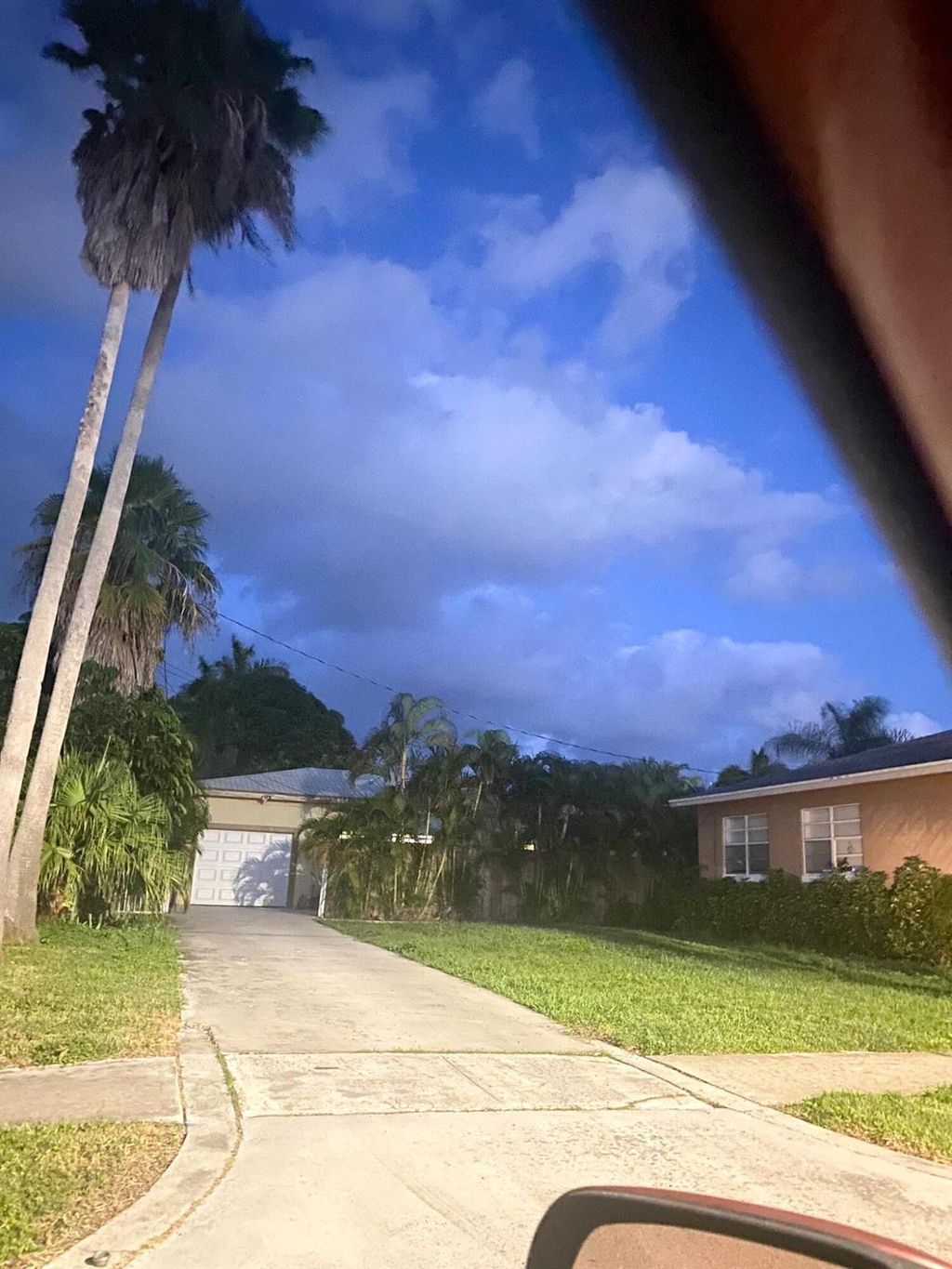 Photo of 135 Hawthorne Drive, Lake Park, FL 33403 (MLS # R11114878)