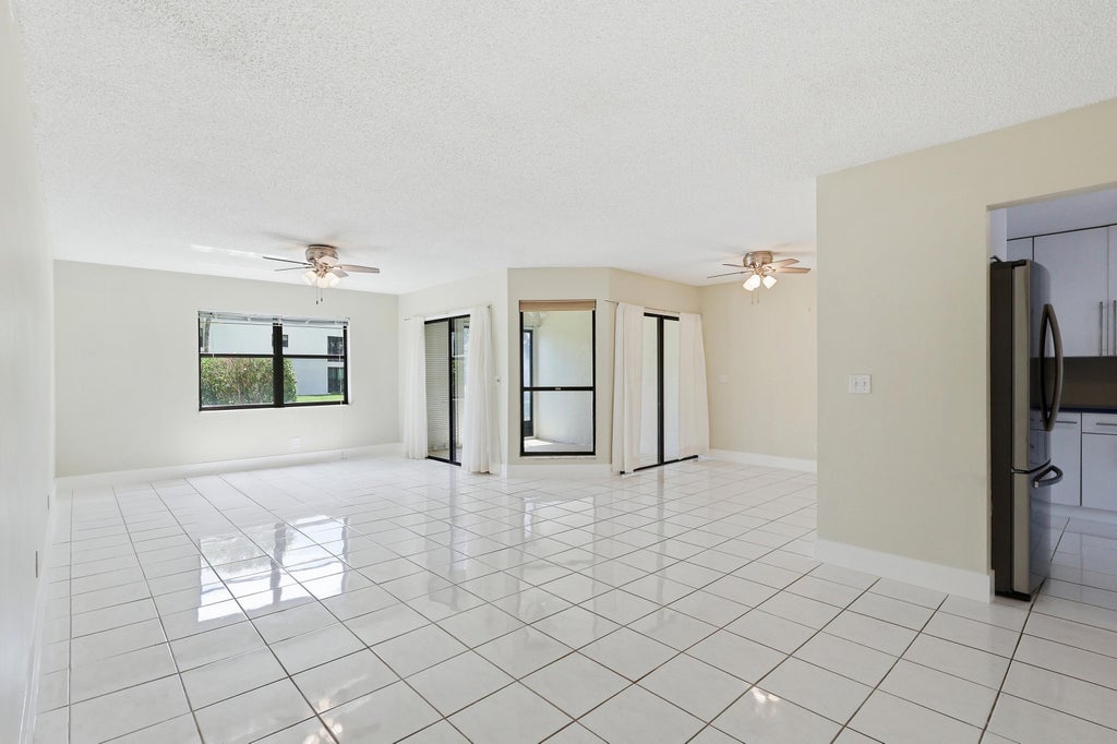 Photo of 3242 Perimeter Drive, Greenacres, FL 33467 (MLS # B26033072)