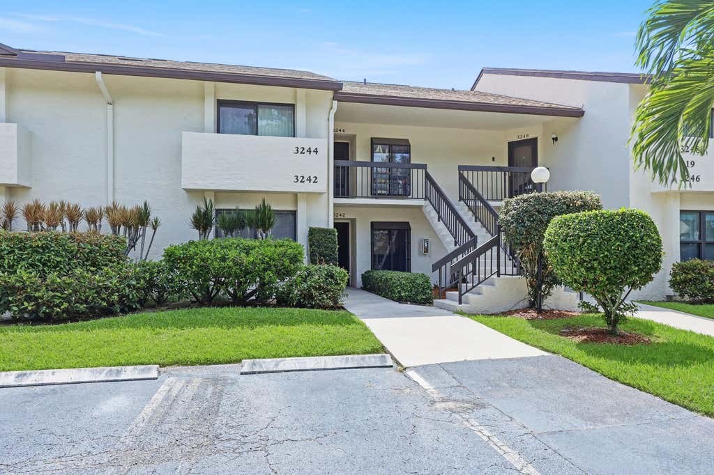Photo of 3242 Perimeter Drive, Greenacres, FL 33467 (MLS # B26033072)