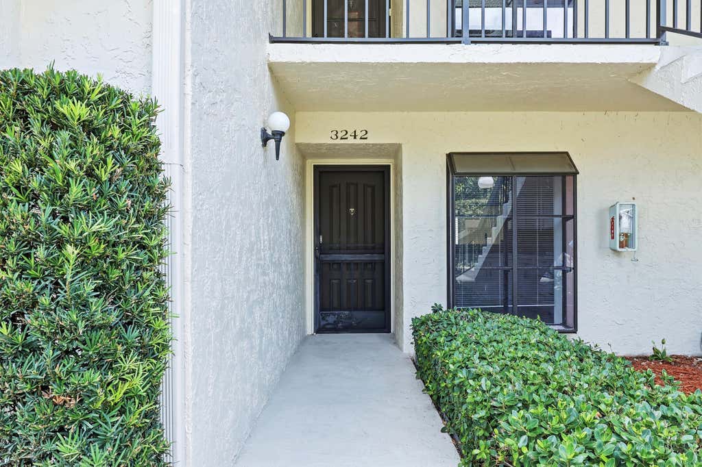 Photo of 3242 Perimeter Drive, Greenacres, FL 33467 (MLS # B26033072)