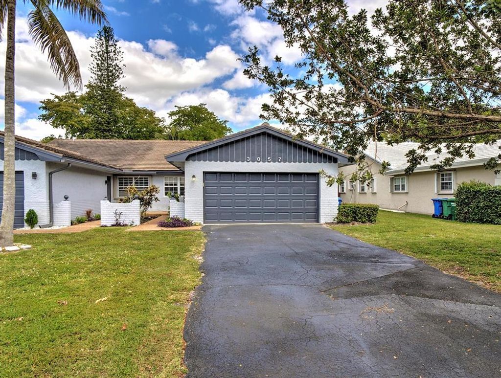 Photo of 3057 NW 103rd Lane, Coral Springs, FL 33065 (MLS # B26011188)