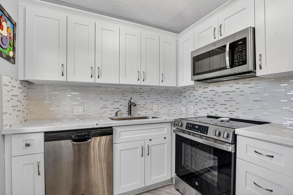 Photo of 585 Mansfield Fld N #585, Boca Raton, FL 33434 (MLS # R11133486)