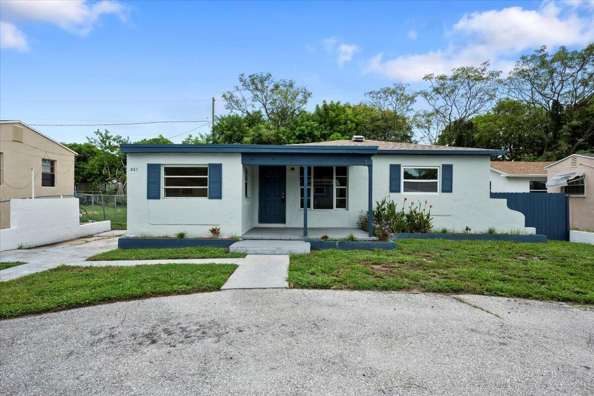 Welcome to this beautifully updated 4-bedroom, 2-bath home in West Palm Beach! Featuring a newer 2021 roof and 2019 A/C system, this property offers peace of mind and modern comfort. Step inside to find a spacious open layout with luxury waterproof vinyl plank flooring throughout and fresh interior and exterior paint.The newly renovated kitchen boasts shaker-style cabinets, stainless steel appliances, quartz countertops, and a stylish tile backsplash, perfect for cooking and entertaining. Both bathrooms have been tastefully remodeled with modern finishes, creating a spa-like feel.With no HOA and priced under $400K, this move-in ready home is a rare find that combines style, comfort, and value. Don't miss this opportunity--this one is going to go fast!