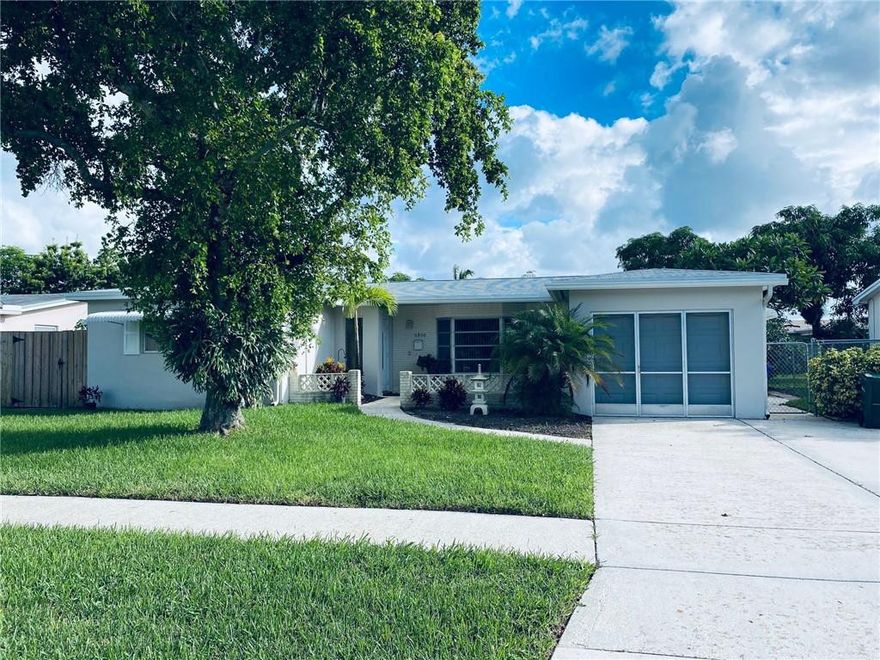 Beautiful, well maintain home that wraps around large  covered  patio and pool area, perfect for family fun and entertaining.  Roof only 4 years old, air condition 2 years old. Freshly painted. Ceramic tile floors throughout the living area. One car garage with screen door. Must see, this property  wont last!Pool needs to be re marcite.