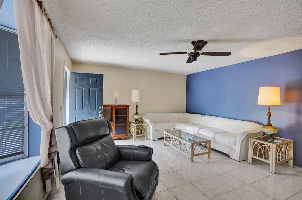 Photo of 2886 Floral Road, Lake Worth, FL 33462 (MLS # B26022044)