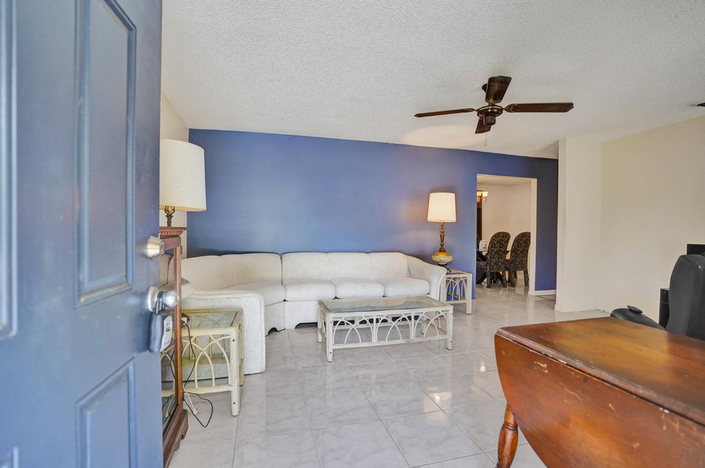 Photo of 2886 Floral Road, Lake Worth, FL 33462 (MLS # B26022044)