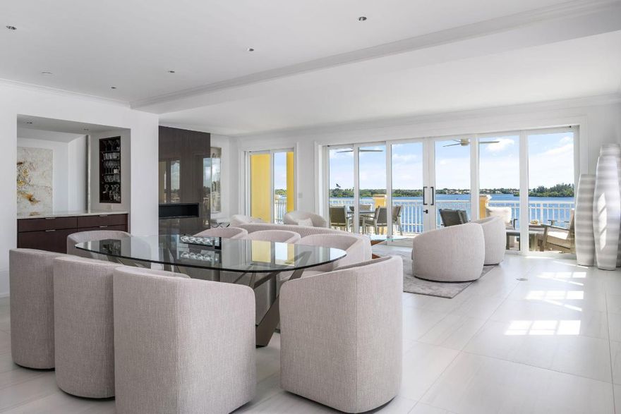 Indulge in the ultimate expression of coastal sophistication with this 2022 fully renovated penthouse overlooking the Intracoastal. A private elevator opens to your grand foyer, introducing a residence defined by elegant design and impeccable craftsmanship. Expansive living and dining rooms flow seamlessly for effortless entertaining, while the gourmet island kitchen features exquisite finishes and top-tier appointments. With 3 bedrooms, 3½ baths, and an expansive balcony capturing panoramic water views, this one-of-a-kind condo embodies the essence of refined waterfront living.