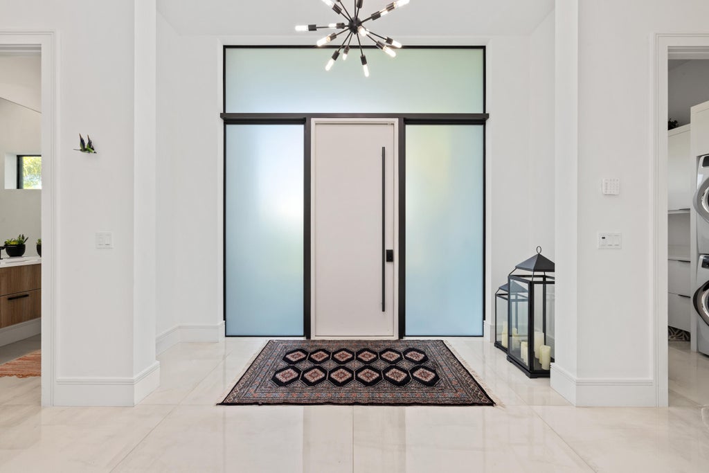 Photo of 10 Coconut Road, Delray Beach, FL 33444 (MLS # B26093809)