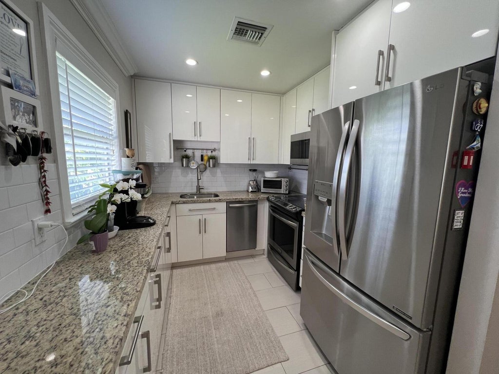 Photo of 705 Monaco O, Delray Beach, FL 33446 (MLS # R11000817)