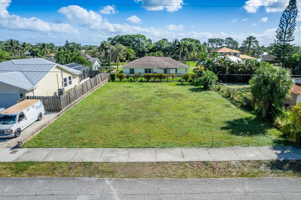 Photo of 5683 SE Inez Avenue, Stuart, FL 34997 (MLS # R10931808)