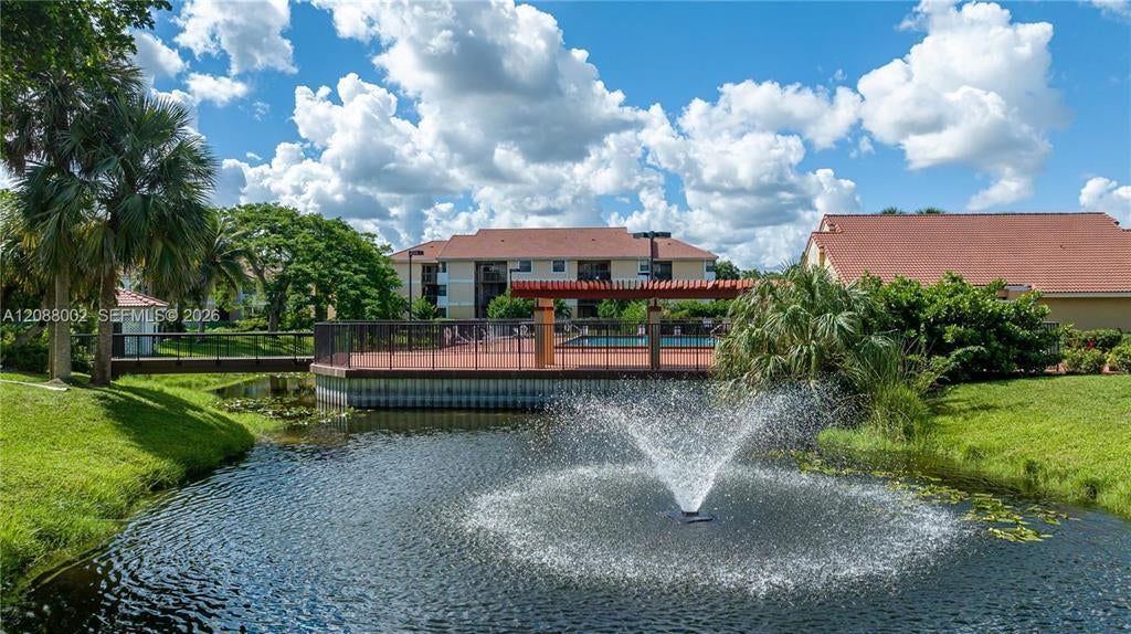 Photo of 5841 RIVERSIDE Drive #102A3, Coral Springs, FL 33067 (MLS # B26087084)