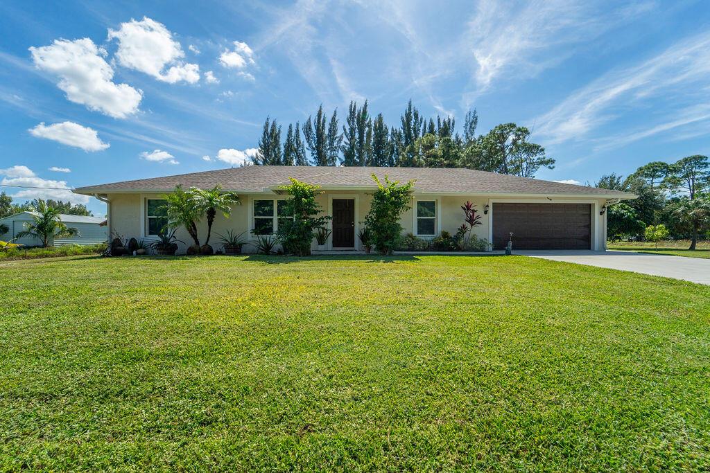 Photo of 12732 61st Lane N, West Palm Beach, FL 33412 (MLS # R10930415)