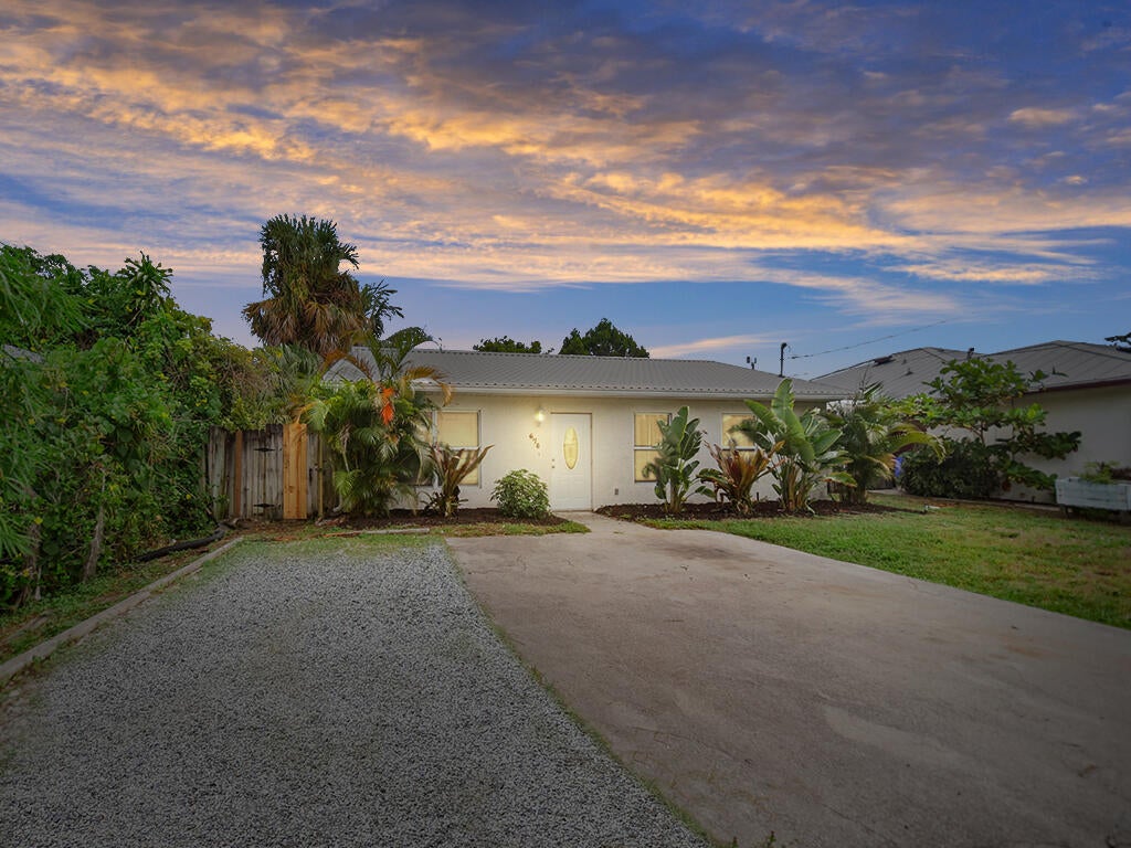 Photo of 675 NE Stuart Street, Jensen Beach, FL 34957 (MLS # R11003286)