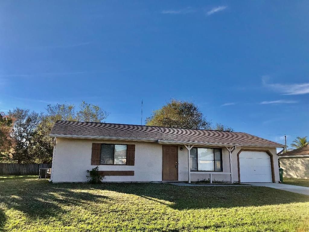 Photo of 2222 SE Maize Street, Port Saint Lucie, FL 34952 (MLS # R10772430)