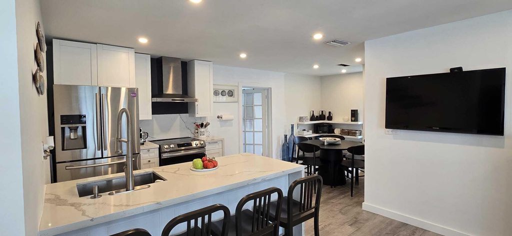 Photo of 330 NE 59th Court, Oakland Park, FL 33334 (MLS # B26025031)