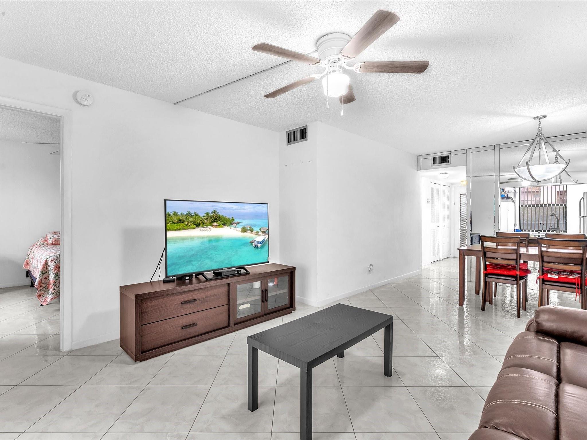 MOTIVATED SELLER!! Sought-after Phase 4 unit with breathtaking views of the lake, fountain, treetops, and golf course. This updated 2 Bed 2 Bath features brand-new washer/dryer in unit, all-tile floors, modern bathrooms and recessed lighting throughout. This well-maintained 55+ community offers fantastic amenities, including a clubhouse, fitness center, theater, billiards, multiple pools, tennis, a courtesy bus, and more! 40-Year Inspection Completed & Reserves in Place. No rentals. Minimum credit score 700, minimum income $37,500, and 20% down required.