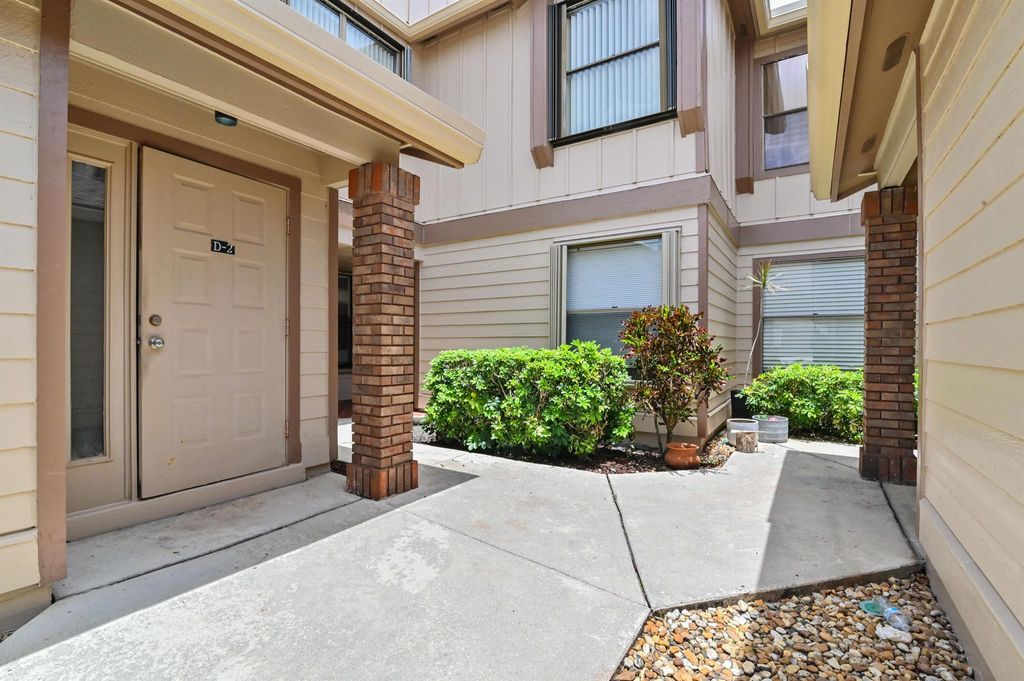 Photo of 500 Crosswinds Drive #D2, Greenacres, FL 33413 (MLS # R11003536)