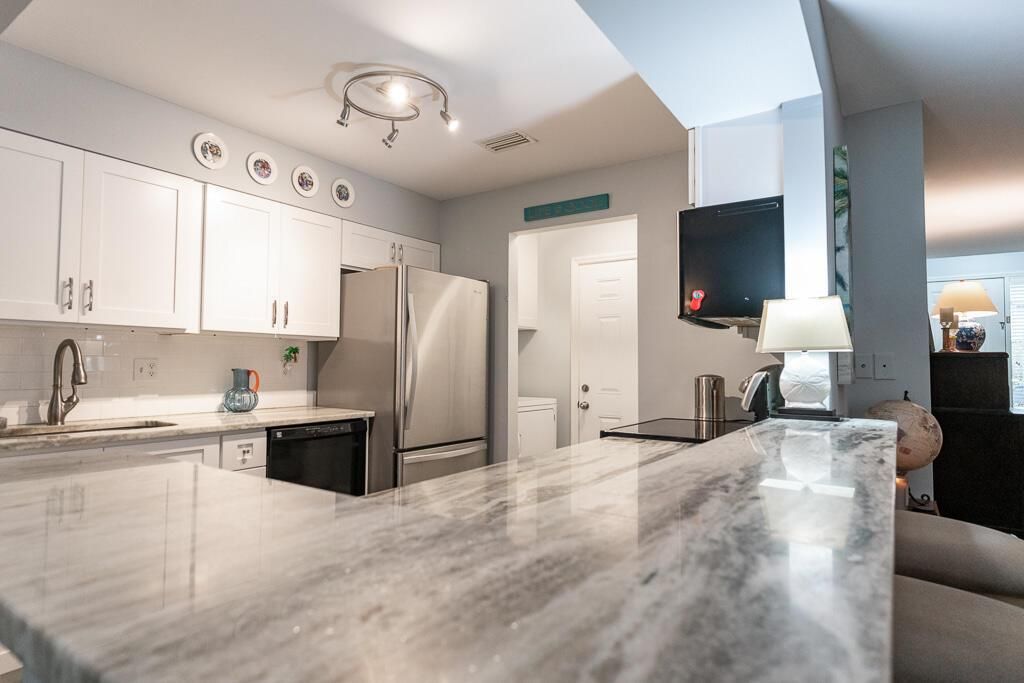 Photo of 692 NE Wax Myrtle Way, Jensen Beach, FL 34957 (MLS # R10766273)