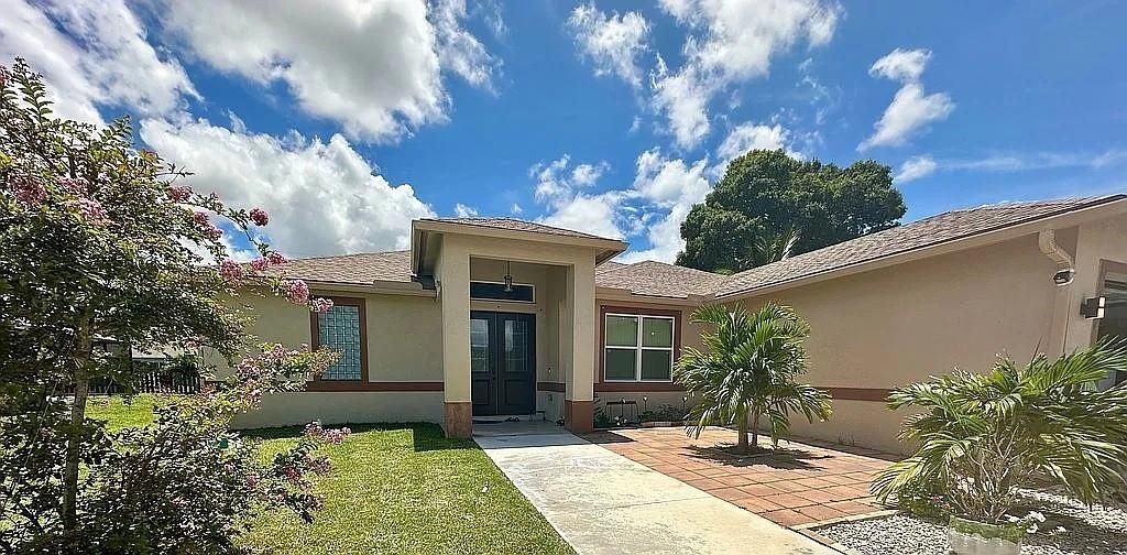 Photo of 2544 SW Cameo Blvd, Port St Lucie, FL 34953 (MLS # F10506012)