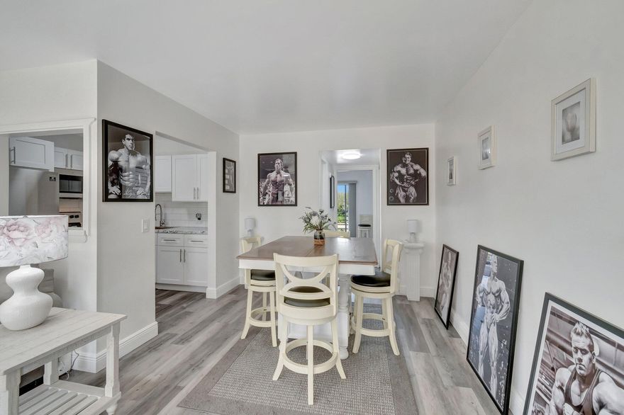 CENTURY VILLAGE--ACTIVE ADULT COMMUNITY.Welcome to unparalleled living in the heart of Florida's pristine Boca Raton. Located within the esteemed Century Village, this charming third-floor corner condo offers a delightful mix of comfort, quality, and tranquility that matches the vibe of this vibrant, Active Adult Neighborhood. At 566 Mansfield N, emphasis is placed on inviting spaces and bright living. Enter into a welcoming and generously proportioned living room that offers ample room for relaxation and entertainment. Follow the free-flowing semi-open concept floor plan to the dining area that allows a smooth transition from kitchen to table.