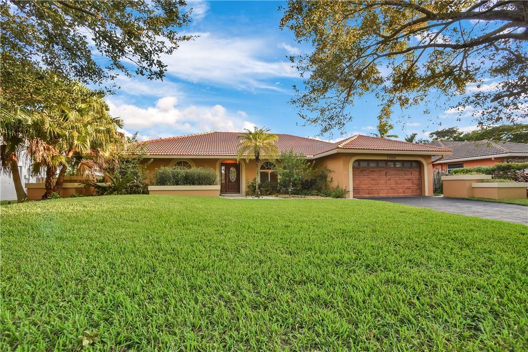 Rarely available 4 bedroom, 2 bathroom home with a backyard oasis in Coral Springs! This naturally bright and
freshly painted home features vaulted ceilings, a large kitchen and hurricane protected windows and doors throughout. Lots of outdoor lighting - great for relaxing out back or hosting. Quick access to major roads, all things shopping, dining and more.