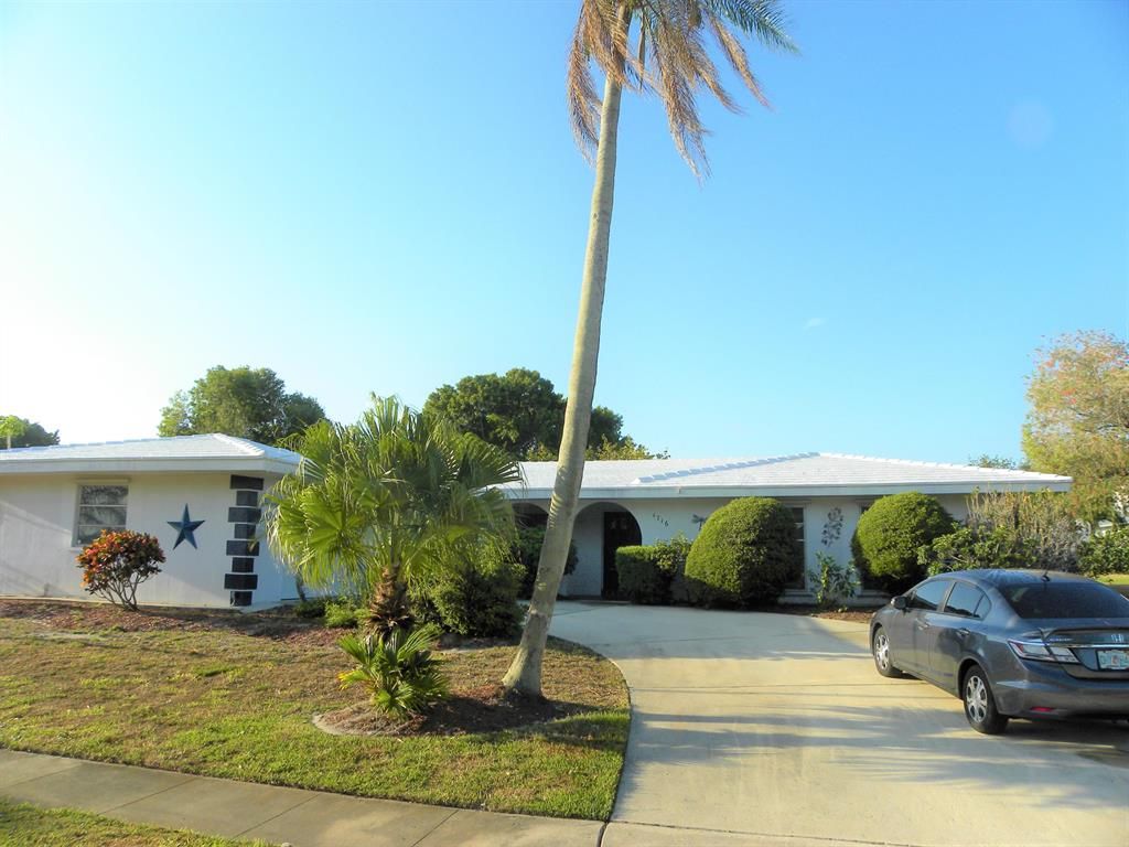 Photo of 1716 SE Adair Road, Port Saint Lucie, FL 34952 (MLS # R10708025)