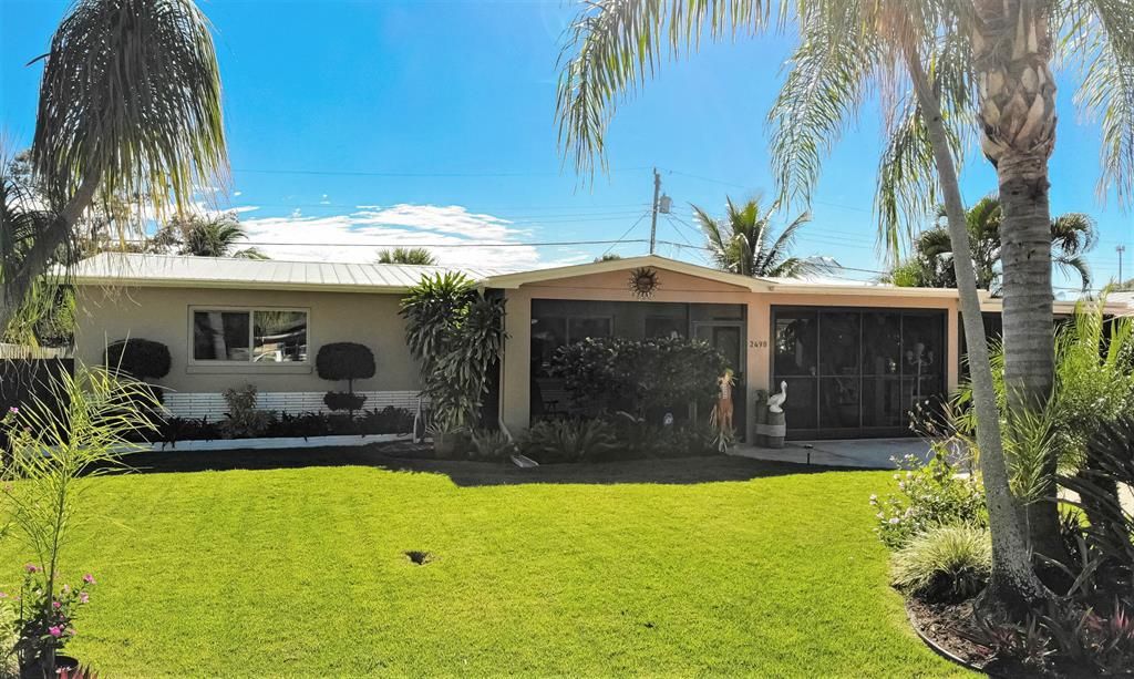 Photo of 2498 NE Wilda Street, Jensen Beach, FL 34957 (MLS # R10759016)