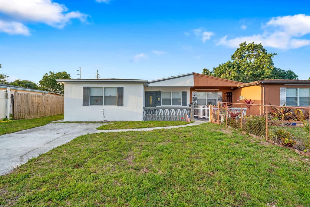 Photo of 5042 Eadie Place, West Palm Beach, FL 33407 (MLS # B26008030)