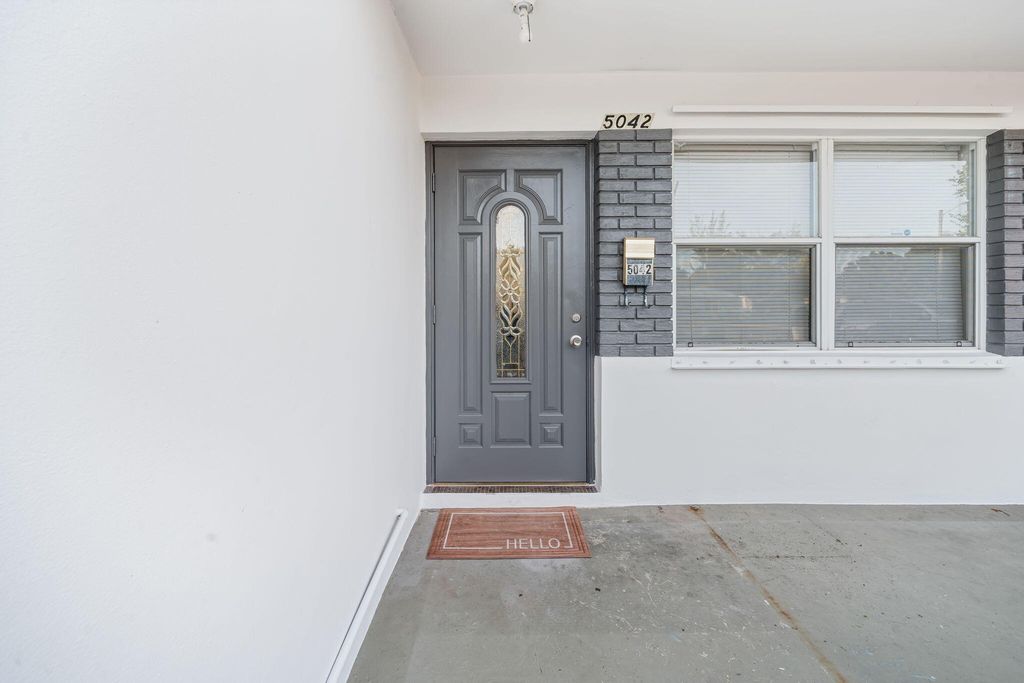 Photo of 5042 Eadie Place, West Palm Beach, FL 33407 (MLS # B26008030)
