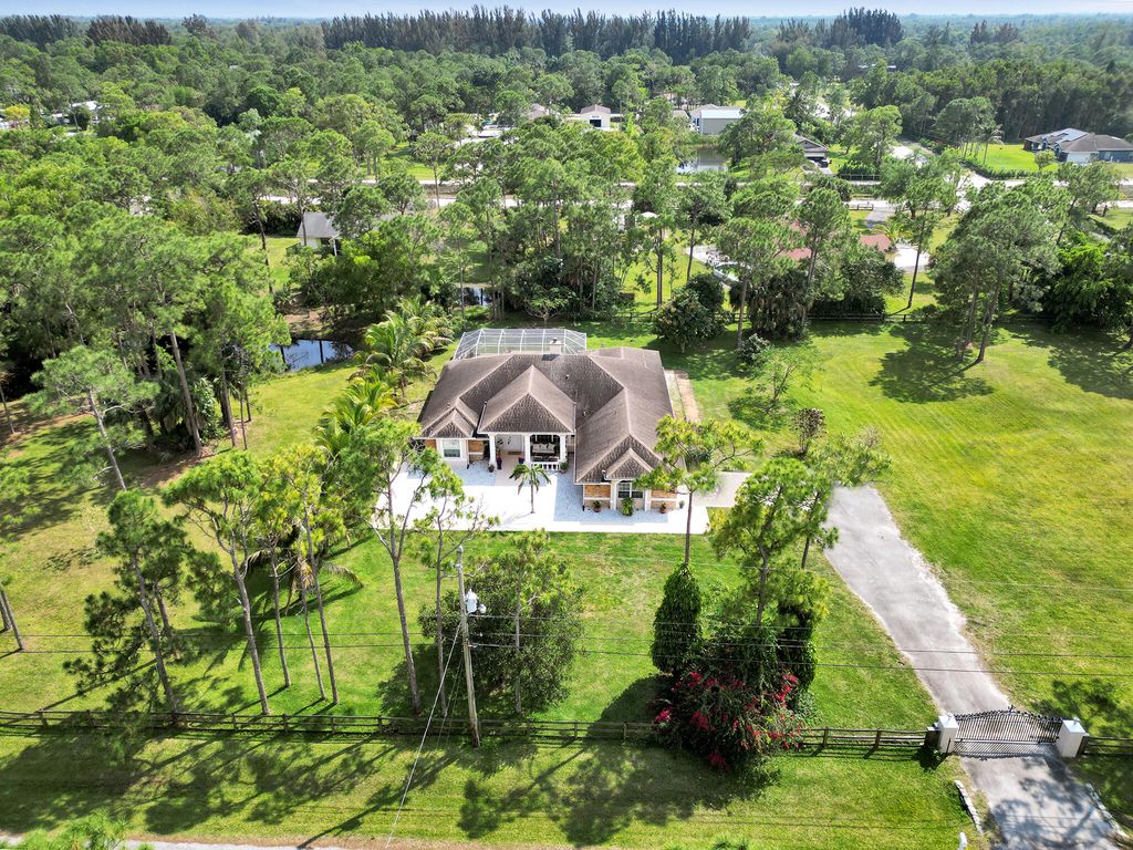 Photo of 12450 N 63rd Lane N, West Palm Beach, FL 33412 (MLS # R10970284)