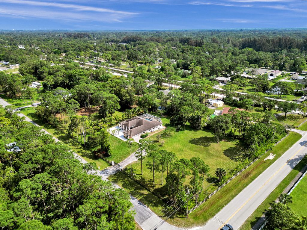 Photo of 12450 N 63rd Lane N, West Palm Beach, FL 33412 (MLS # R10970284)