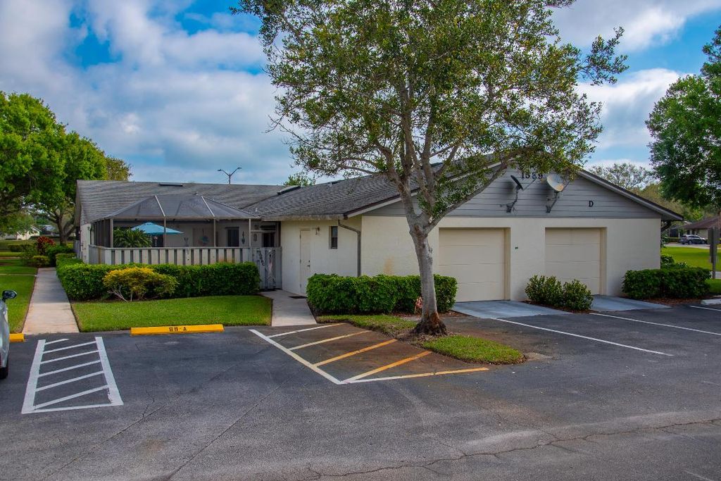 Photo of 1569 Pheasant Walk #C, Fort Pierce, FL 34950 (MLS # R11068787)
