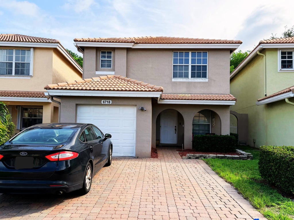 Photo of 6718 Duval Avenue, West Palm Beach, FL 33411 (MLS # B26038292)