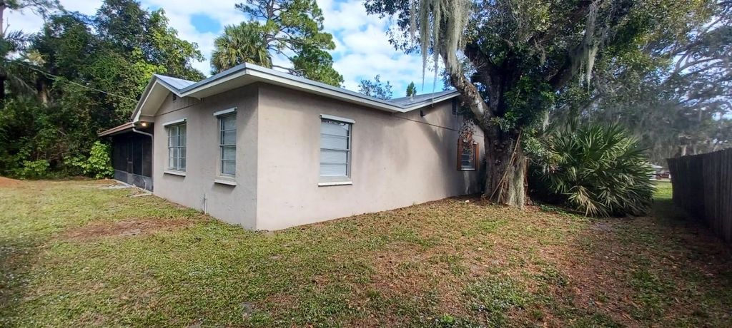 Photo of 6009 Fort Pierce Boulevard, Fort Pierce, FL 34951 (MLS # F10413045)