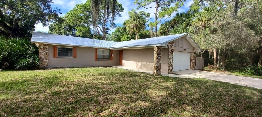 Photo of 6009 Fort Pierce Boulevard, Fort Pierce, FL 34951 (MLS # F10413045)