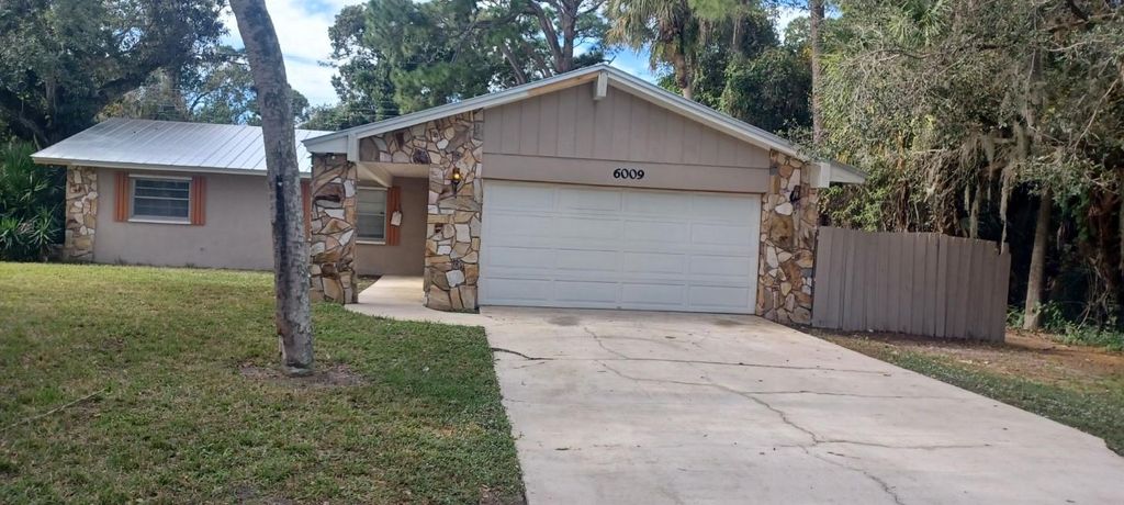 Photo of 6009 Fort Pierce Boulevard, Fort Pierce, FL 34951 (MLS # F10413045)