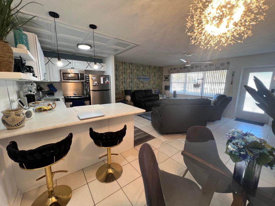 Absolutely beautiful & charming 1 BE, 1.5 BA condo on the second floor in a gated community of Century Village in WPB*Recently remodeled in today's modern style*Open kitchen  with newer cabinets, tile backsplash, SS appliances and extended countertop for high chairs*The spacious living room provides plenty of room for relaxing and entertaining*Good size bedroom*Elegant Ma Ba with new vanity, mirror, lighting & additional cabinetry*Enjoy the covered & screened balcony*All tiles & laminate floor*Cable & laundry service included in rent*Walking distance to a pool*Enjoy amazing community amenities and a convenient location close to shopping, restaurants, Florida beaches & Palm Beach International Airport*Come see it for yourself-you won't be disappointed-and make this your new home!