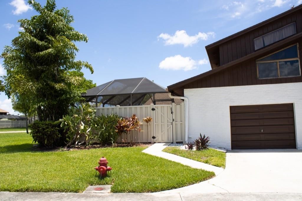 Photo of 9604 Boca Gardens Pkwy Pkwy #Apt A, Boca Raton, FL 33496 (MLS # F10338369)